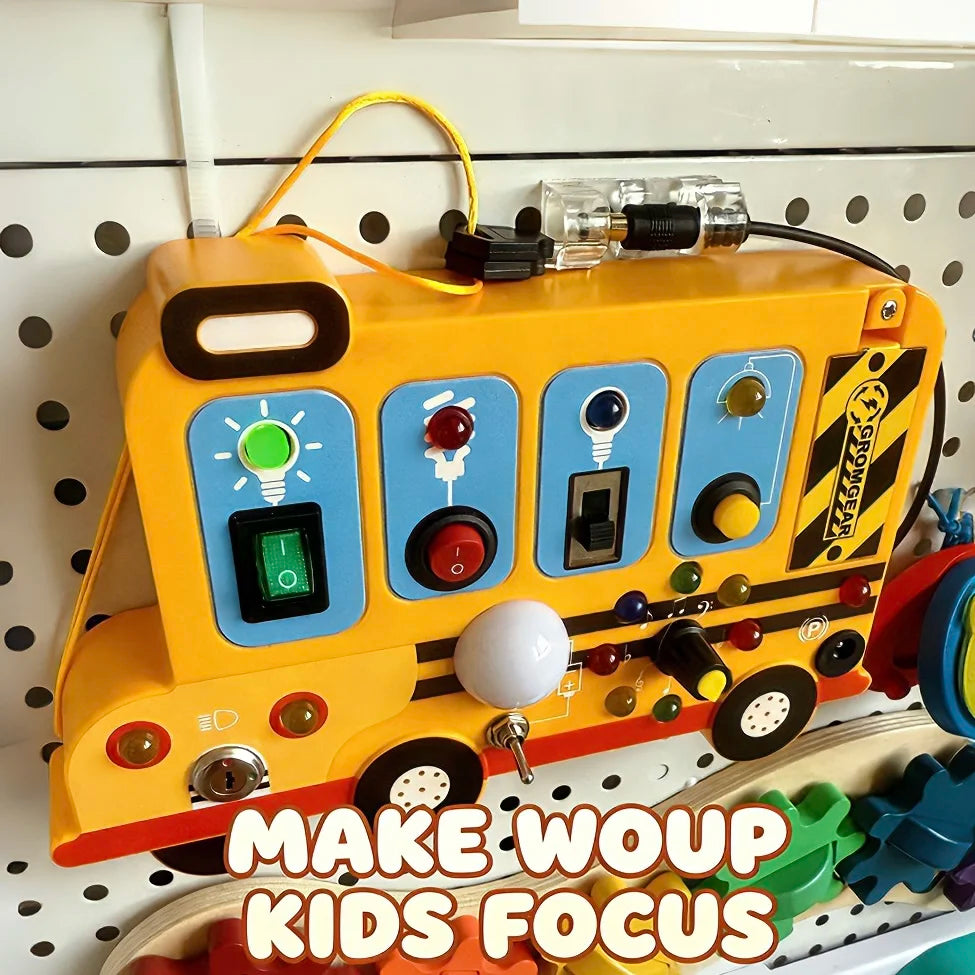 This interactive, school-bus-themed busy board learning toy features LED lights, switches, and realistic engine sound effects.